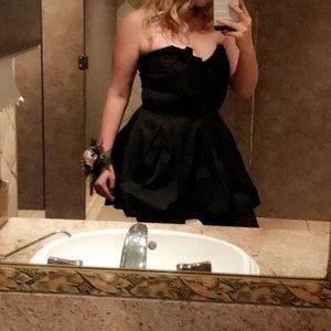 2 mini black dresses